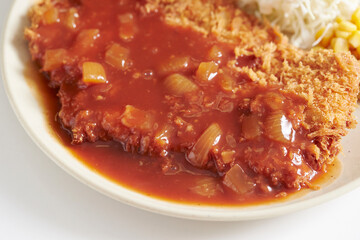 Pork cutlet with delicious sauce on a plate