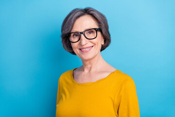 Portrait of attractive cheerful content wise woman wearing specs eye sight vision view isolated...