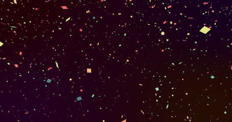 Multicoloured pieces of confetti falling seamlessly on a black background