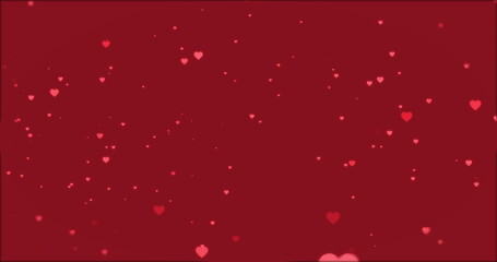 Pink hearts falling on a dark red background