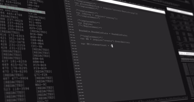 Image of data processing on grey computer screens