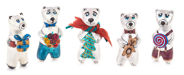 Decorative bears, hand made of papier mache, in Ukrainian style souvenir, isolated on white