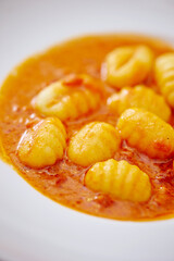 Tomato stew, vegan food on plate 