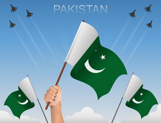 Pakistani flags flying under the blue sky 