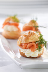  Profiteroles stuffed with cream cheese and salmon.