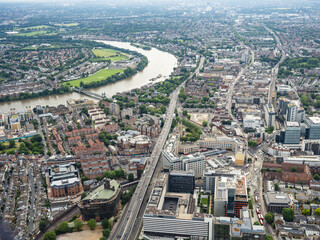 Fototapeta na wymiar London and The River Thames from the air June 2021, Including Hammersmith Bridge