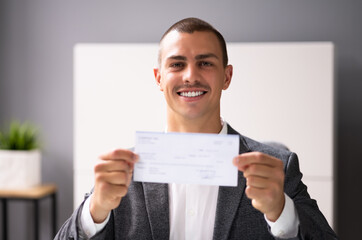 Black Business Man Holding Pay Check
