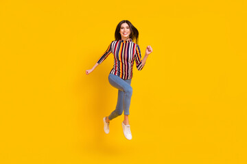 Fototapeta na wymiar Full length body size photo girl in casual clothes running on sale isolated bright yellow color background
