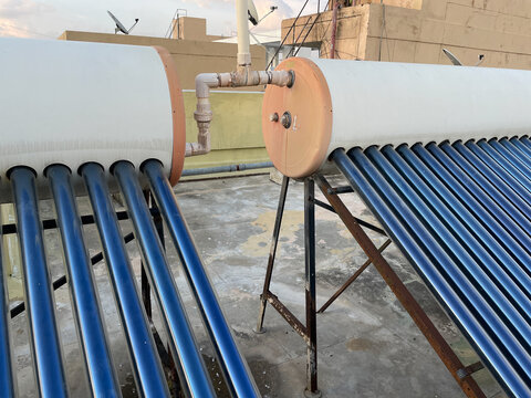 Solar Panel Tubes Installed On Roof Tops To Conserve Energy And As Alternative Source Of Energy At Bengaluru India On 30 June 2021
