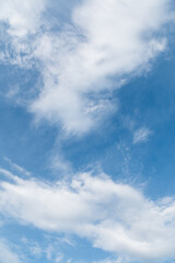 blue sky background with tiny clouds