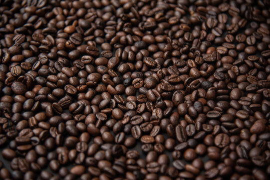Roasted coffee beans with background. © Sirisab