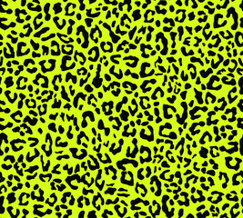 Leopard print vector seamless pattern, yellow background, trendy texture for textiles.