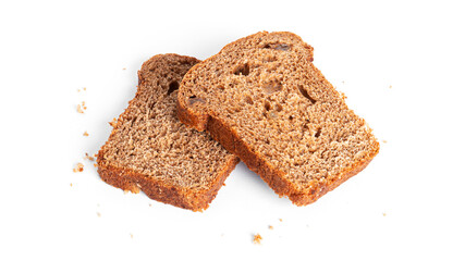 Black, rye bread with dried fruit on a white background.