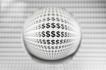 Glass globe with dollar signs.