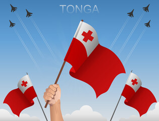 Tonga flags flying under the blue sky 