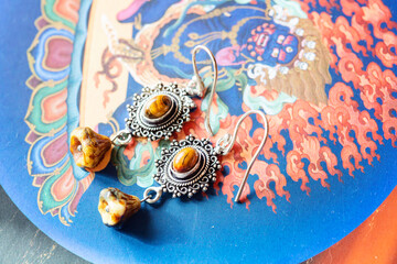 Beautiful jewelry earrings with gemstone mineral in Indian boho style decorative design