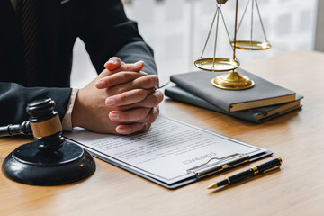 Attorney or judge sitting at the desk, listen. Businessman, business auditor, teacher, professor...