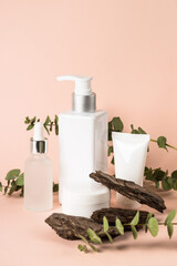 Natural cosmetic product at pastel background. Skincare product with natural leaves and tree bark.