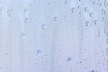 drops glass blue background abstract, transparent cold background water splashes