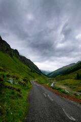 alpin road with dark clouds (Montafon, Austria)