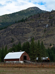 Farm barn in mountain scene