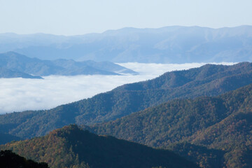 Fototapeta na wymiar A morning cloud in the valley
