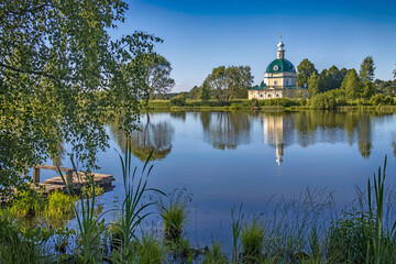 Fototapeta na wymiar MOSCOW REGION, RUSSIA - June 10, 2021, Church of Michael the Archangel in the village of Tarakanovo, Moscow region. In this church the poet Block and Mendeleyeva were married in 1903