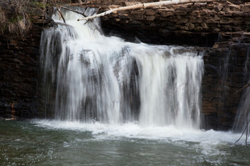 Fototapeta premium Waterfall outdoors in the sunshine
