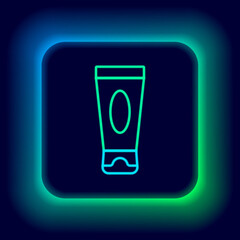 Glowing neon line Cream or lotion cosmetic tube icon isolated on black background. Body care products for men. Colorful outline concept. Vector