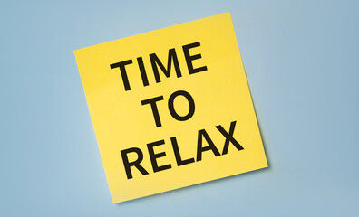 TIME TO RELAX word concept on sticker against light blue background