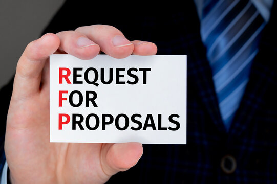 Concept image of Accounting Business Acronym RFP Request For Proposal written over business card help by businessman