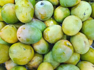 close up of fresh mango. Tropical fruit being sold in the fresh fruit market