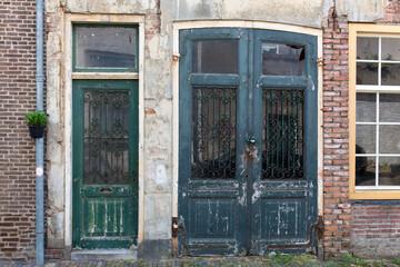 Fototapeta na wymiar Authentic colorful brick house fronts - facades in the historical center of Zwolle, The Netherlands.