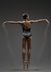 Young ballerina showing her theatrical dance perfomance