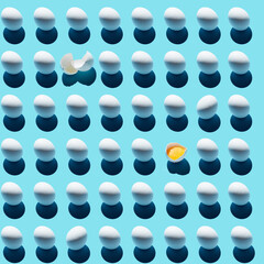 Pattern of white eggs isolated on blue background.Concept