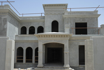 Fototapeta premium Construction site near Abu Dhabi,Uae.Future living compound in desert