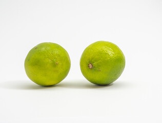 Limes on a white background. Fresh and ripe.