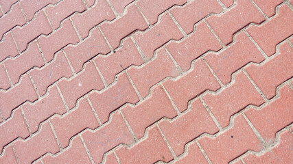 red paving stones with a visible texture. background or textura