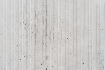 Fototapeta na wymiar White metal texture background with vertical lines and small dirt spots.