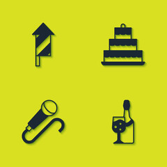 Set Firework rocket, Champagne bottle, Microphone and Cake with burning candles icon. Vector