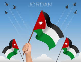 Jordan flags fluttering under the blue sky