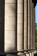 Outside pillars of roman catholic church named Liebfrauen at City of Zurich on a cloudy summer day. Photo taken July 2nd, 2021, Zurich, Switzerland.