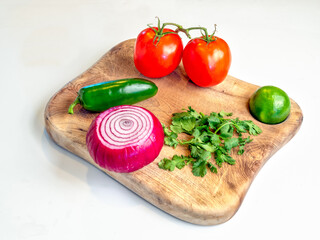 Fresh vegetable ingredients for making salsa or Pico-gallo
