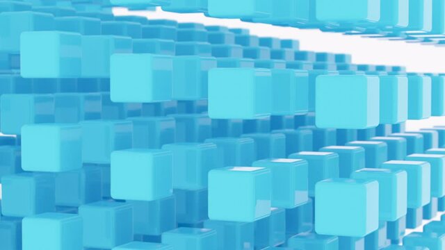 Abstract animation of cubes in the form of a three-dimensional wave. 3D simulated blue cubes are moved by a wave of 4k render.