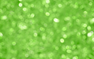 Obraz premium Abstract background of green bokeh lights