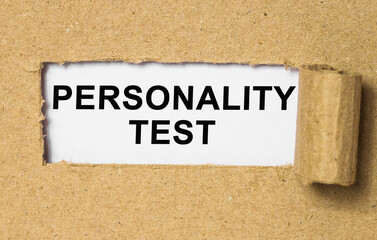 The text Personality test behind torn brown paper. Business Concept image