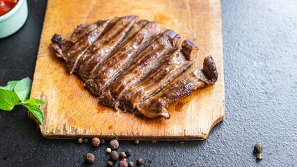 fresh steak beef juicy grilled meat barbecue portion B-B-Q on the table, healthy food meal snack copy space food background rustic. top view keto or paleo diet