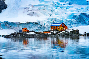 Almirante Brown Antarctic Base Paradise Harbor Antarctic Peninsula Antarctica. Glacier is blue because air is squeezed out of snow. © Danita Delimont