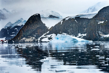 Almirante Brown Antarctic Base Paradise Harbor Antarctic Peninsula Antarctica. Glacier is blue...