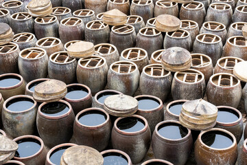 China Fujian Province Xiapu Nantang. Fish sauce is made at this factory where the fermentation takes place in this giant ceramic pots.